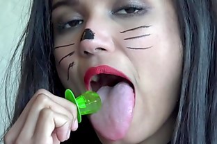 Licking a Lollipop.  Cat Pet Play. Viva Athena sucks a ring pop as a lollipop licker.  How many licks will it take for her to finish?  Don't you wish this was your cock?