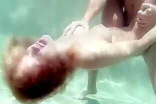 Swingers in Crotchless Rimjob underwater