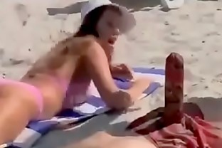 Tongue Nudist funny at Beach