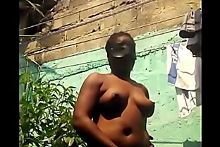 Jamaican woman naked in my garden