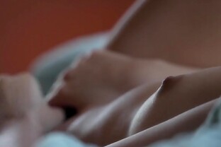 Solo brunette with a nice pair of small tits