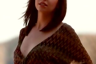 Beautiful brunette with big tits outdoors