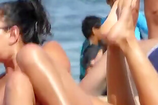 Topless girls at a beach