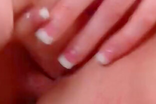 Brunette with a big toy in her tight pussy