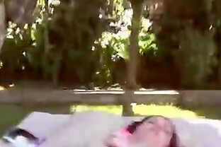 Redhead with hairy pussy fucks a pink dildo