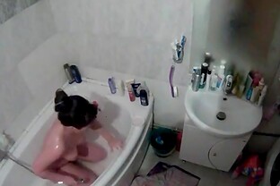 Chubby girl masturbating in the bathtub