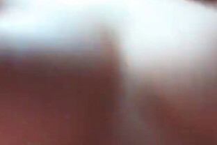 Asian girl in a hood sucks cock