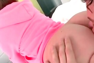 Cute girl in a pink sweater sucks a dick