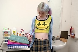 Skinny amateur girl masturbates in the bathroom