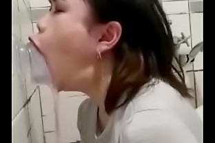 Asian in Blouse doing Stretching