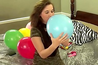 Blowing Balloons and Popping Them While Chewing Bubblegum